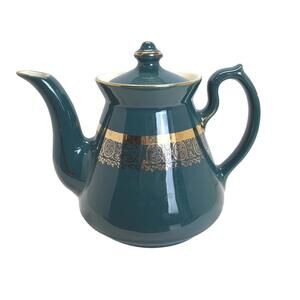 MCM Hall China 6-cup teapot with teal glaze and gold trim.